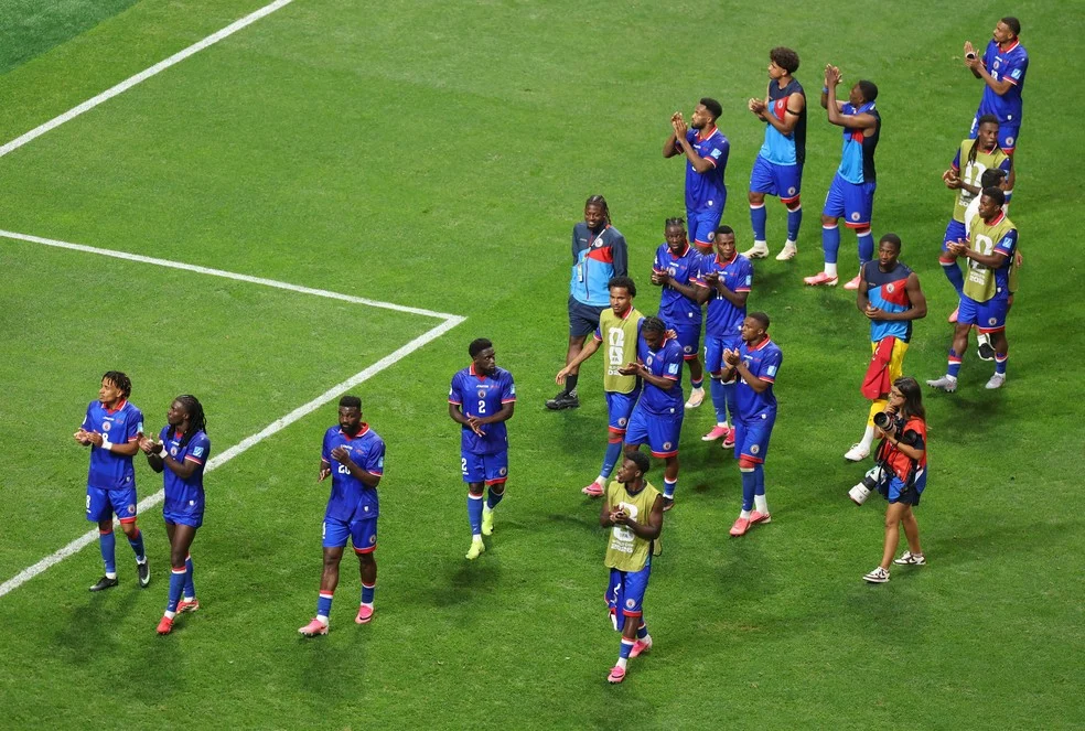 Jogadores do Haiti na Copa comemoram