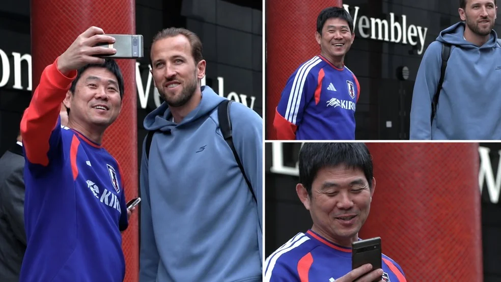 Hajime Moriyasu sorrindo em selfie com Harry Kane