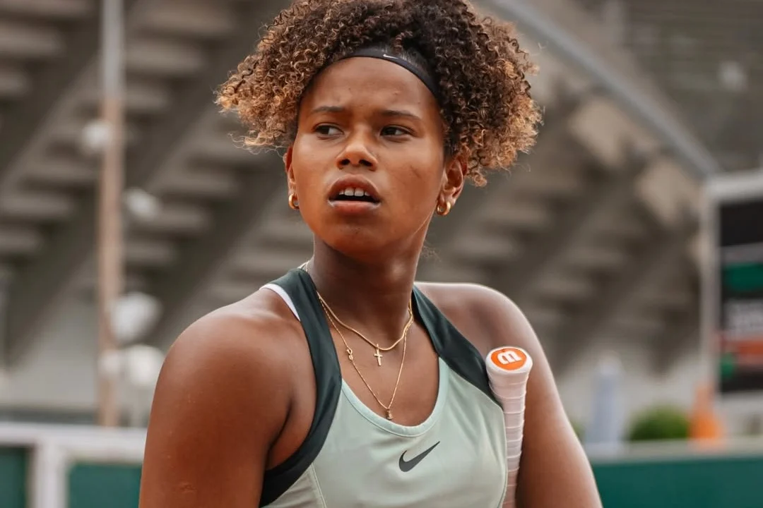 Victoria em Wimbledon em ação na quadra